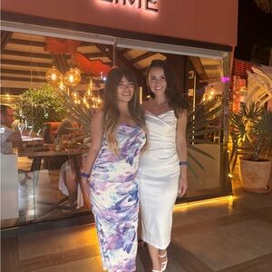 White sleeveless dress. Worn once from Club London.